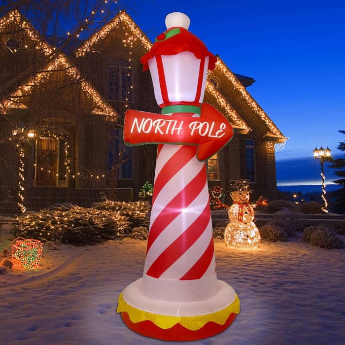 La meilleure option de décorations gonflables de Noël : panneau gonflable du pôle Nord avec lumières LED intégrées