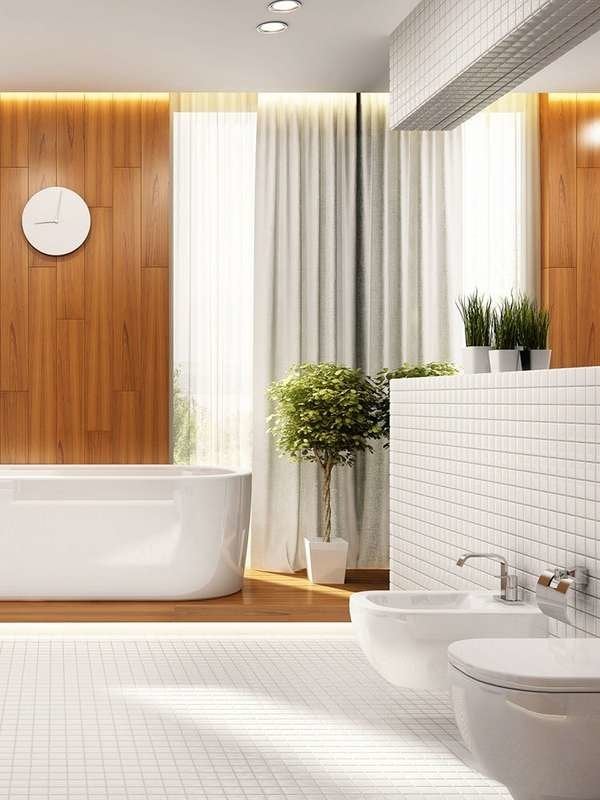 Salle de bain avec carrelage blanc et murs en bois