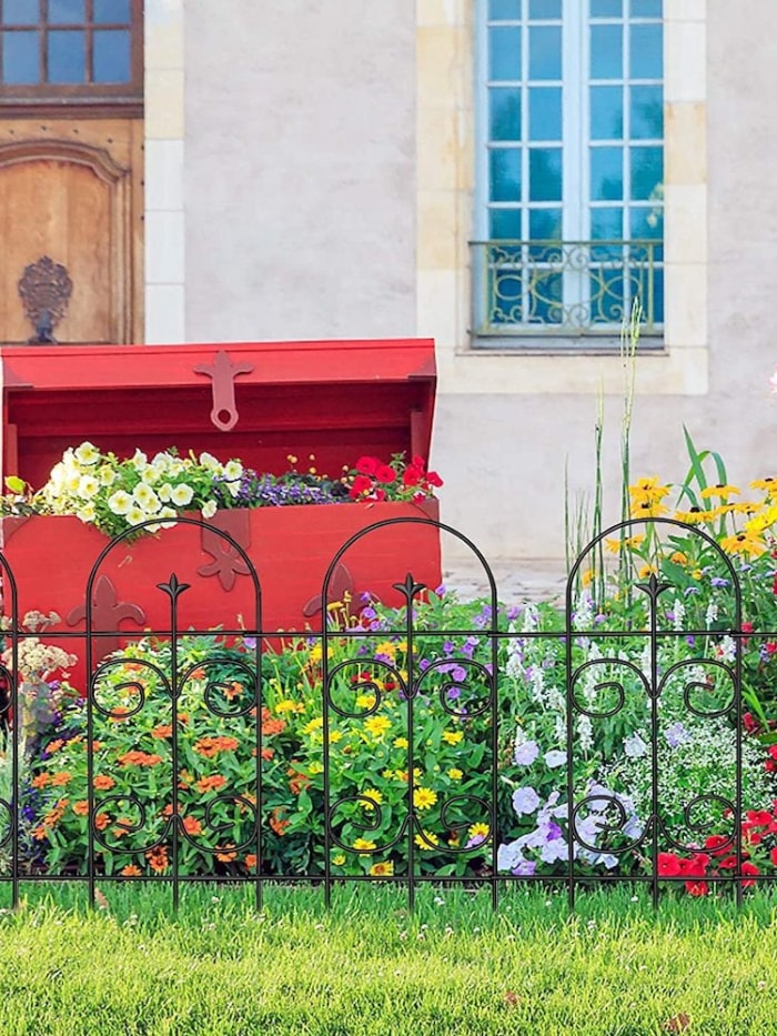 11 idées de clôtures de jardin qui complèteront n'importe quel paysage