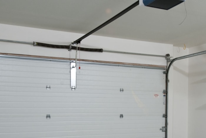 Remplacer un ressort de porte de garage : Ressorts de torsion pour porte de garage