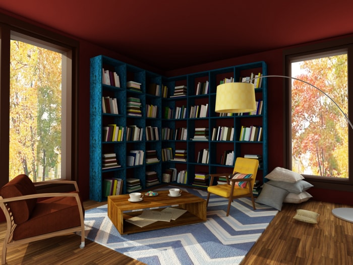 Bibliothèque domestique avec plafond de couleur rouge foncé et étagère bleue.