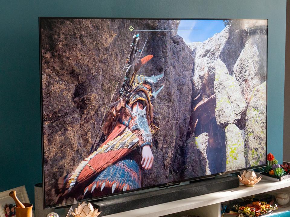 TCL Q7 QLED TV with a still from Horizon Forbidden West