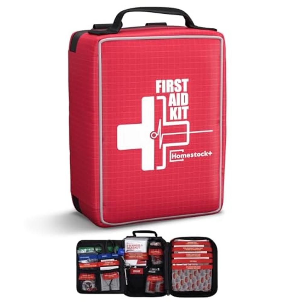 Red, white and black soft zip first aid kit on a white background