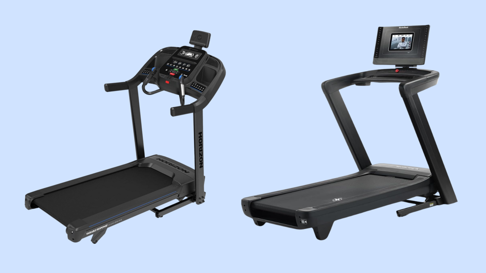 Two folding treadmills on a light blue background