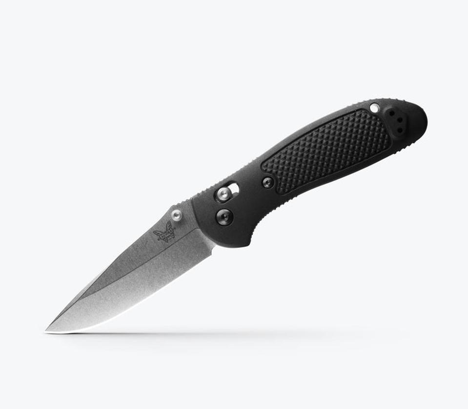 Product shot of a Benchmade Griptillian pocket knife with a black handle.