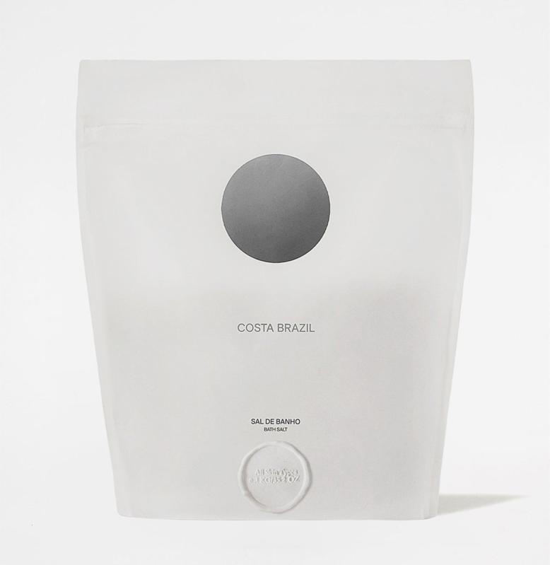 best bath products: White bag with black circle and stamp