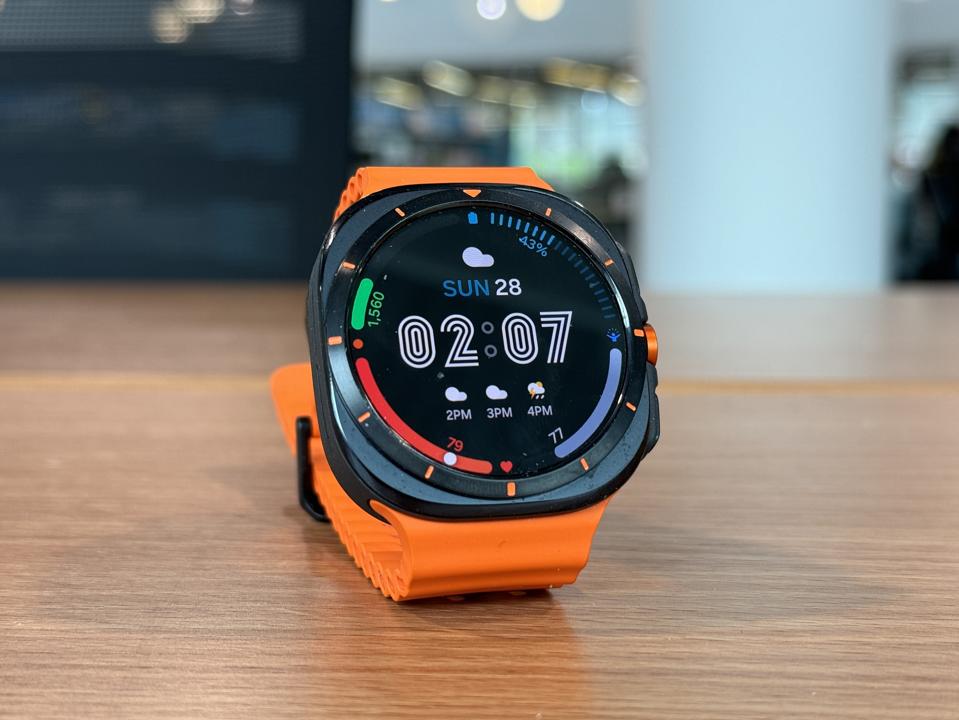 Samsung Watch Ultra on a wooden table