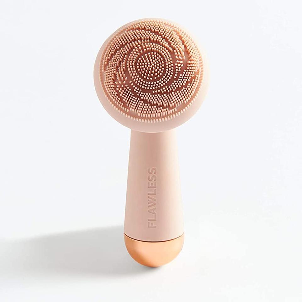 Finishing Touch Flawless Face Scrubber on a white background.