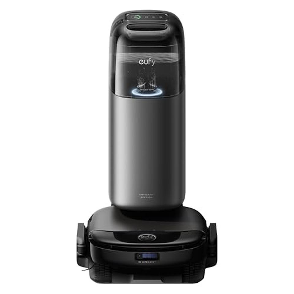 The eufy S1 Pro Robot Vacuum in black attached to its cleaning station