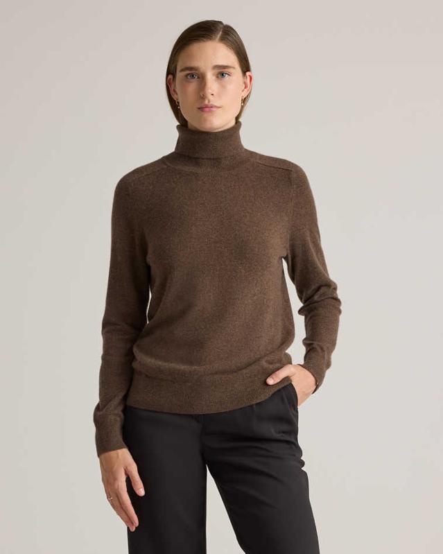 Quince Mongolian Cashmere Turtleneck Sweater on model.