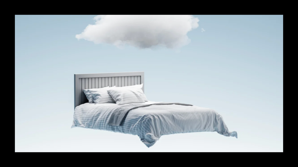 A bed floating in the air with a cloud above it. 