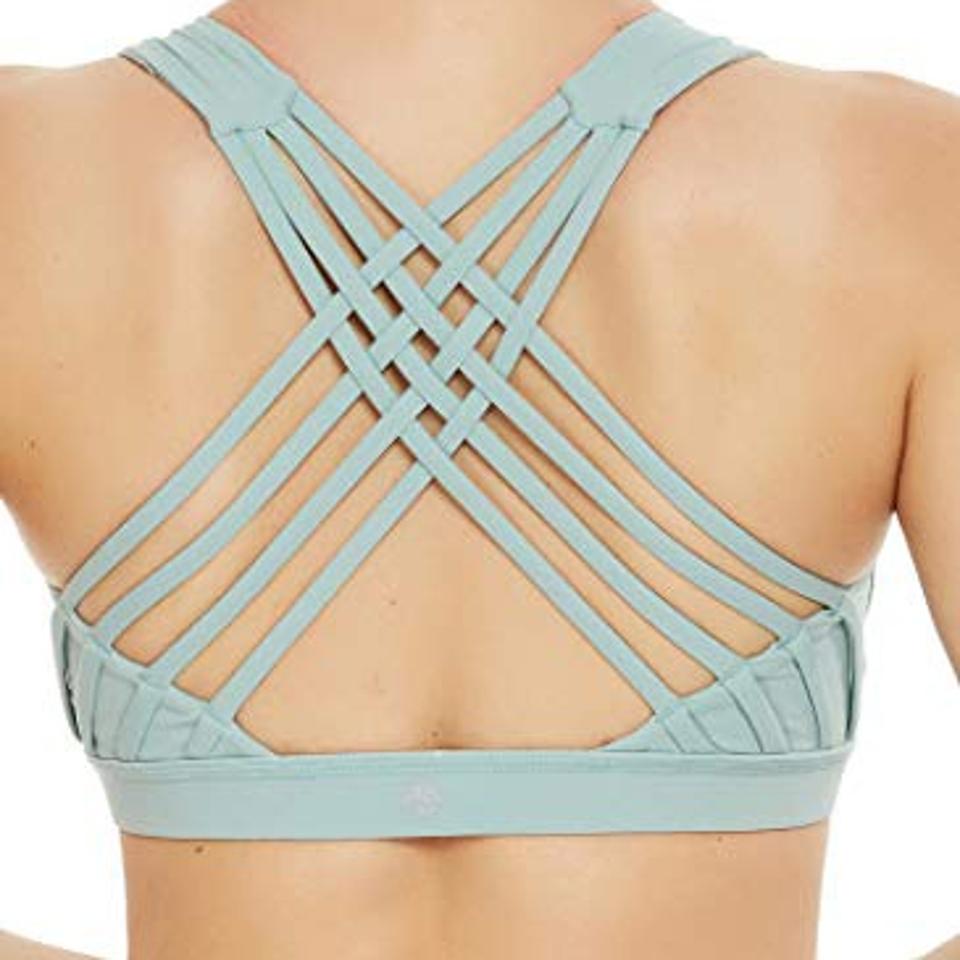 QUEENIEKE Women's medium support strappy back sport bra in pastel green.