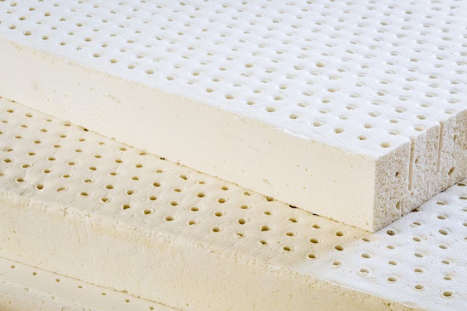 natural latex mattress layers stacked on top of one another. 