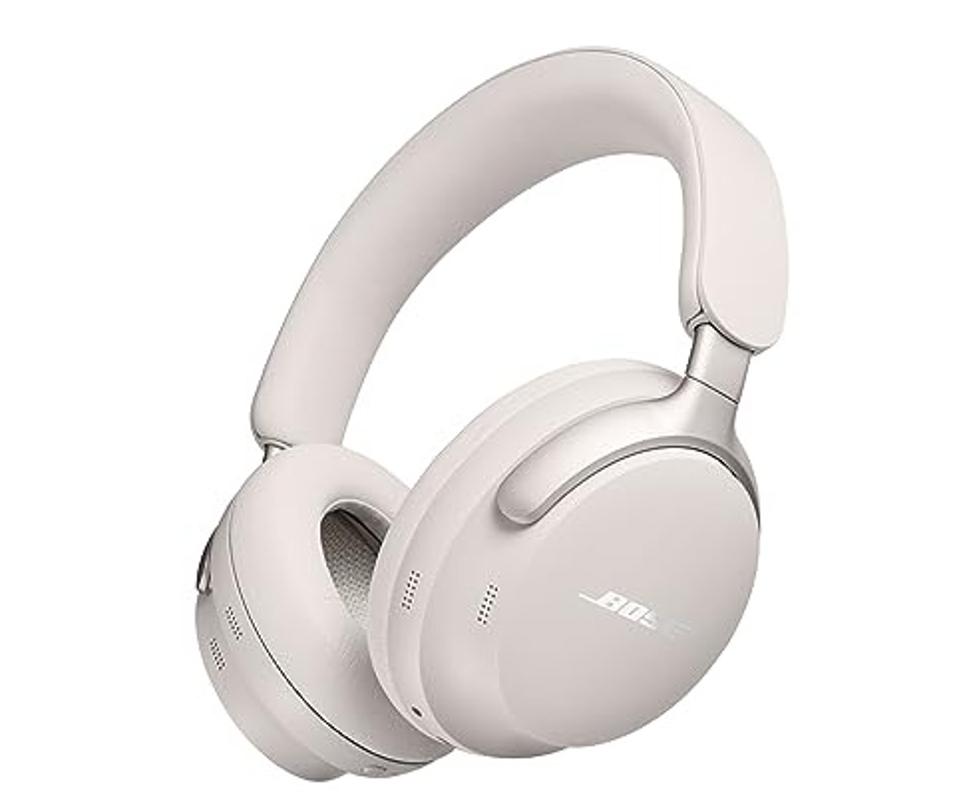 Bose QuietComfort Ultra headphones in white on a white background