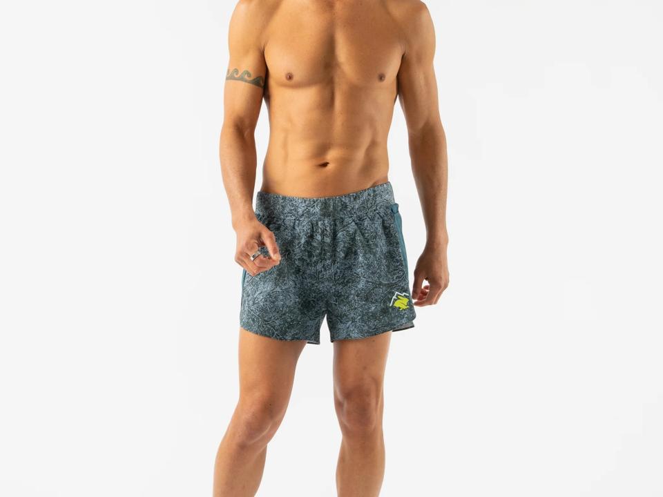 A man wearing the Rabbit FKT 2.0 Shorts