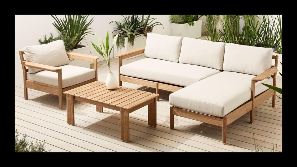 Lifestyle image of a west elm playa coutdoor conversation set.