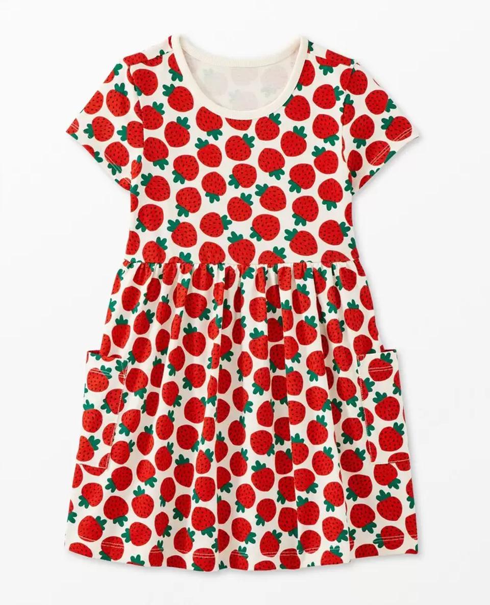 Product shot of a Hanna Andersson Playground Dress with Pockets in the strawberry pattern.