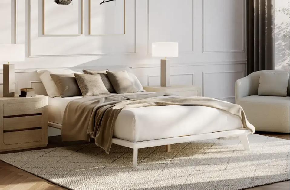 The DreamCloud Aurora Bed Frame in a bedroom with neutral colors. 