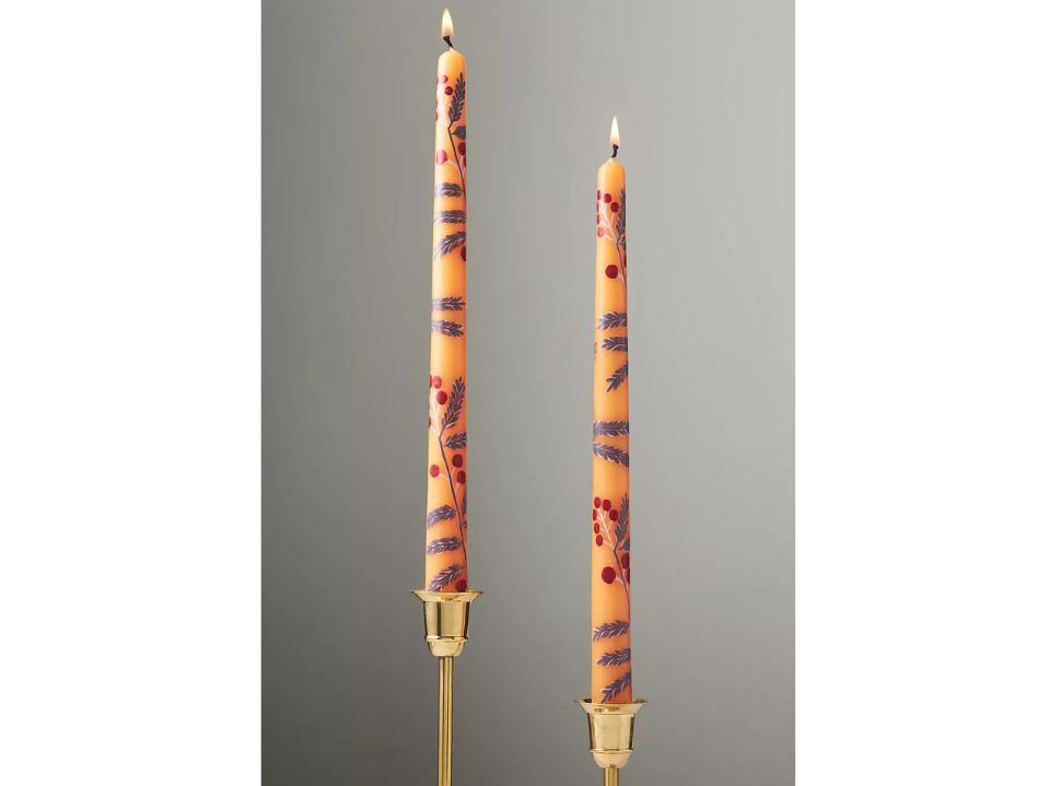 Anthropologie Handpainted Harvest Taper Candles set of 2 12-inch lit on grey background