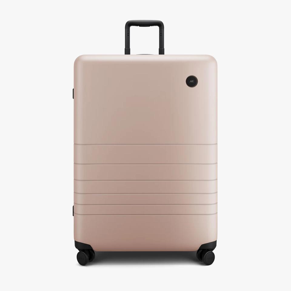 Monos Check-In Large in Rose Quartz.