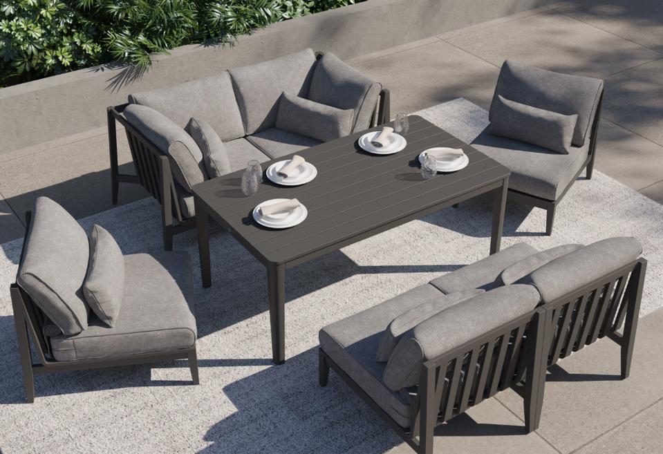 image of 2 outer gray aluminum chairs & 2 aluminum loveseats w/ charcoal coffee table outside