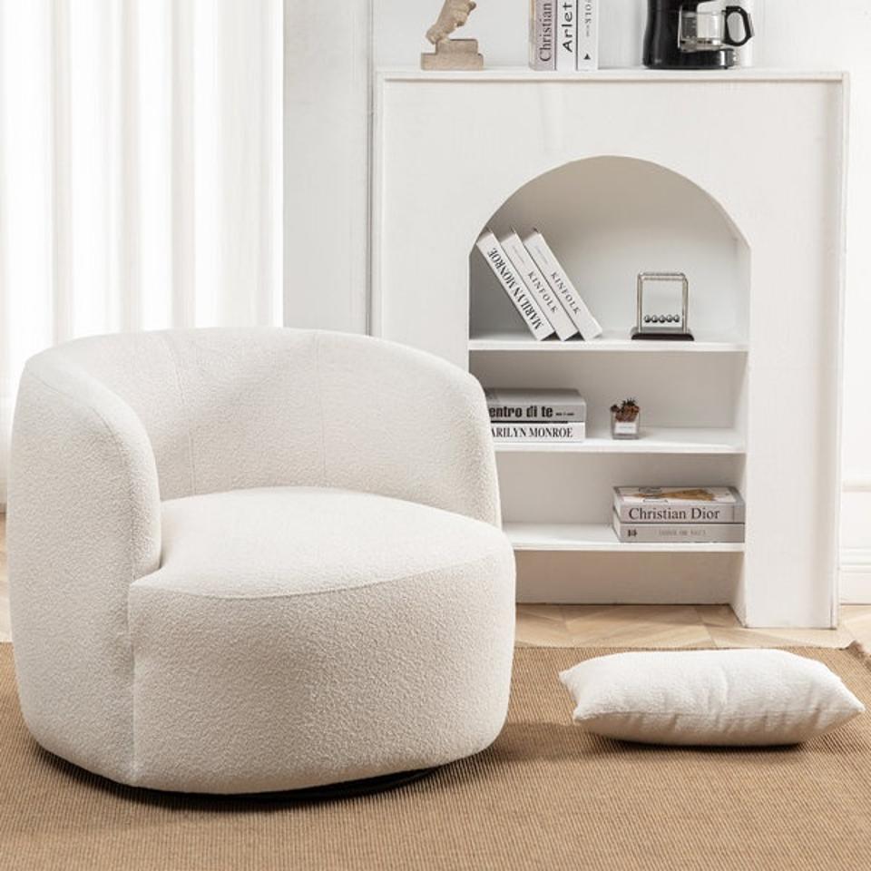 Wayfair Carrena Boucle Swivel Chair in a living room.