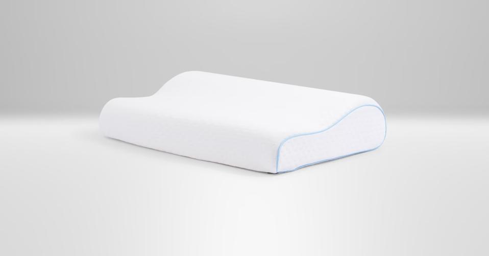 TEMPUR-Neck Pillow on a white surface