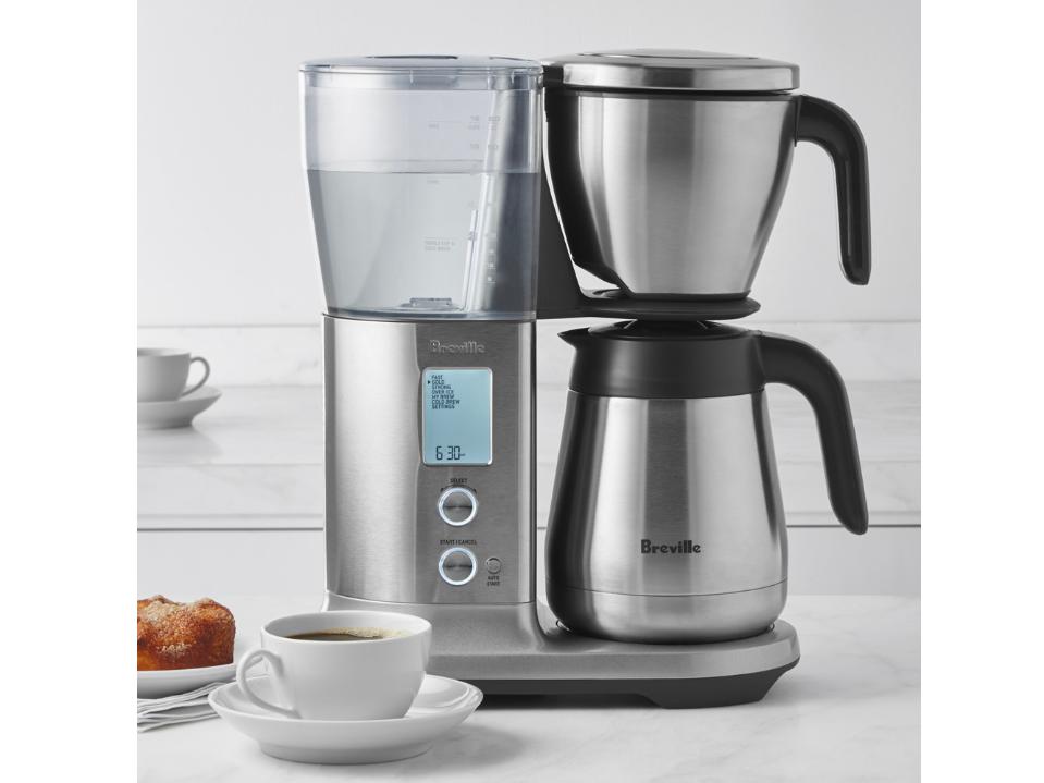 image of Breville Precision Brewer Thermal on white kitchen counter next to cup & pastry