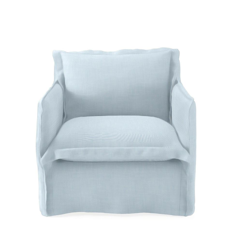 Serena & Lily Beach House Swivel Chair on a white background.