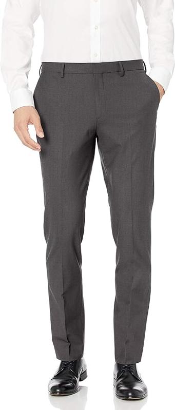 Amazon Essentials Men's Slim-Fit Wrinkle-Resistant Stretch Dress Pant in charcoal on a male figure