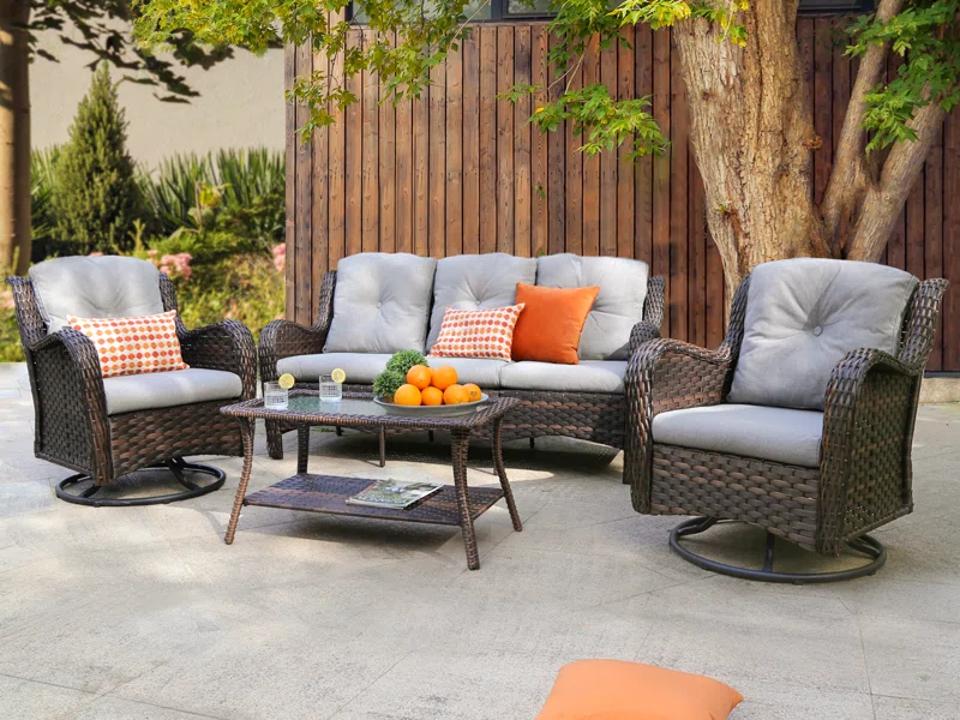 Lark Manor Alejah Five-Person Outdoor Seating Group in front of fence in outdoor space.