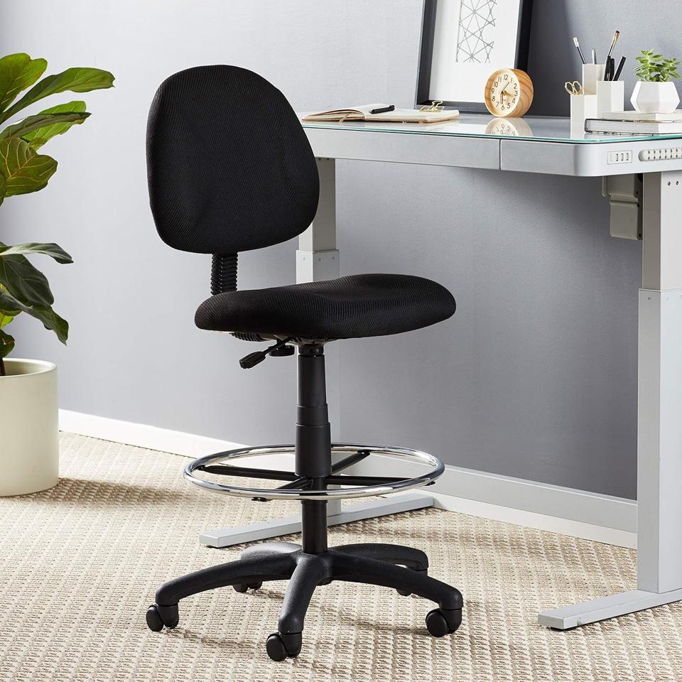 The Boss Office Drafting Chair in front of a standing desk