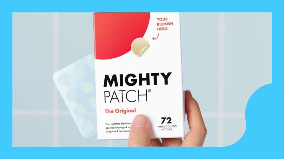 A photo of a pack of Mighty Patch pimple patches held up in a bathroom