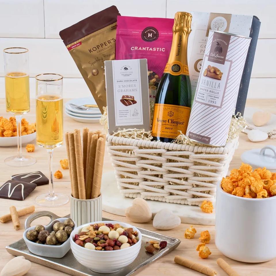 GourmetGiftBaskets.com A Little Veuve And Cheer Basket on table