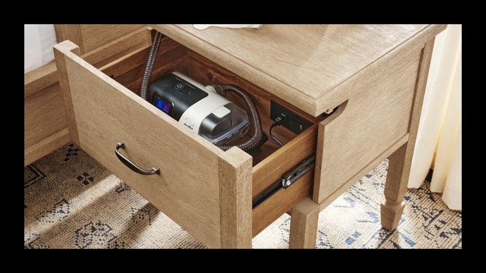 The Pottery Barn Sausalito Nightstand with a CPAP machine in it with a black border