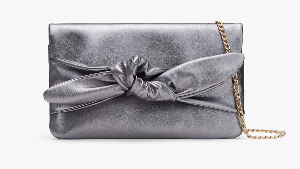 Cuyana Bow Clutch in a shimmer grey