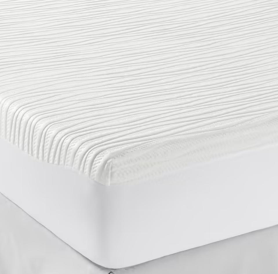 Sleep Number Total Protection Mattress Pad over a mattress