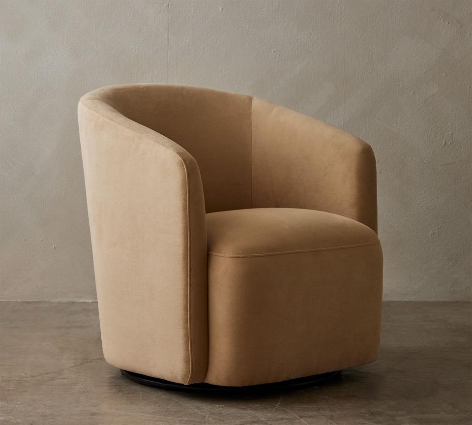 Pottery Barn Preston Swivel Armchair in a living room.