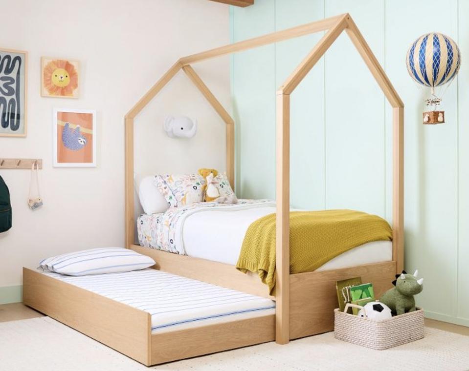 West Elm Tent Bed with trundle in the corner of a chic child's room