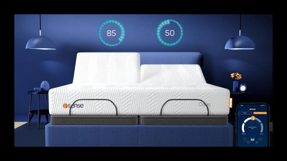 The isense classic dual comfort mattress in a split king with one half raised on a frame