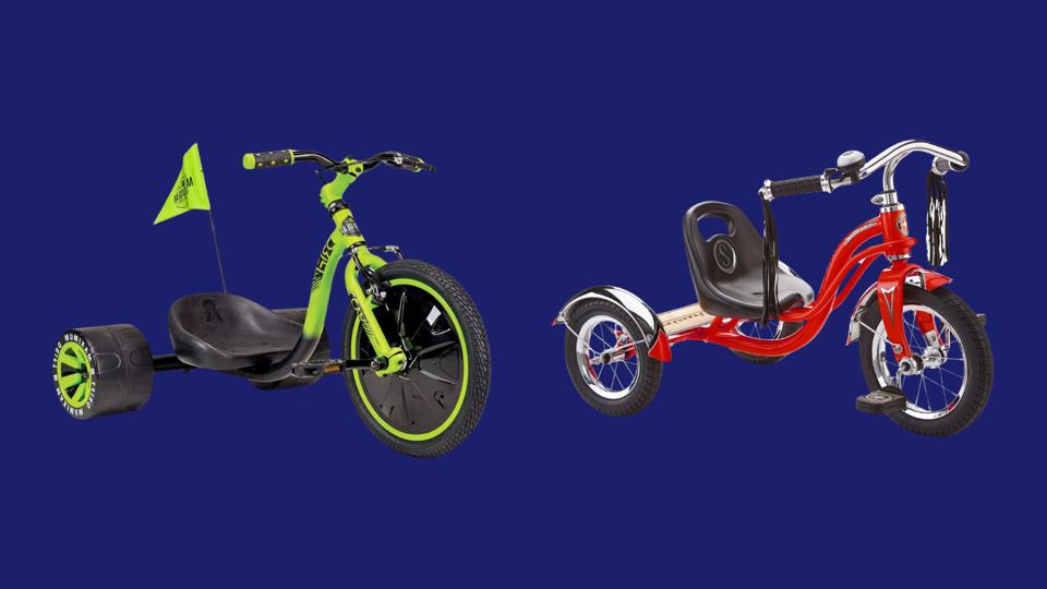 The Madd Gear Drift Trike and Schwinn Roadster Tricycle against a dark blue background.