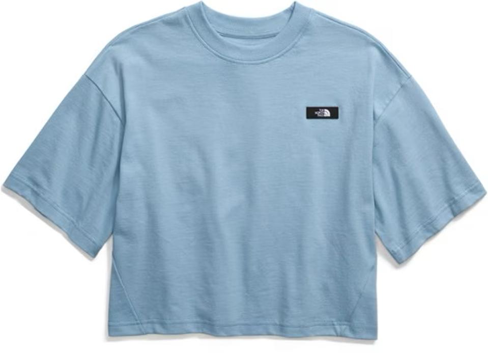 Product shot of The North Face Heavyweight T-Shirt in the steel blue colorway.