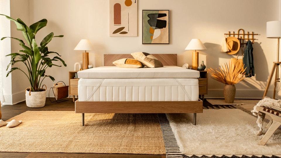 Tempur-Pedic Tempur-Adapt Topper on a mattress in a brightly lit room. 