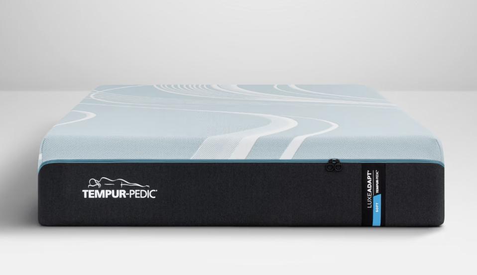 The Tempur-Pedic Tempur-LuxeAdapt Soft mattress against a grey background.