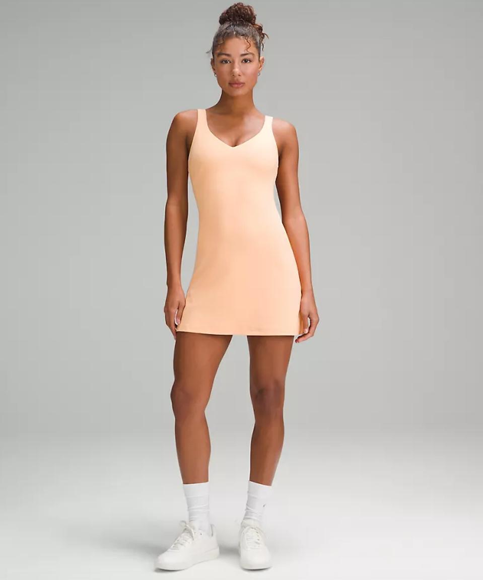 Woman wearing a Lululemon Align Dress in the Strawberry Milkshake colorway.