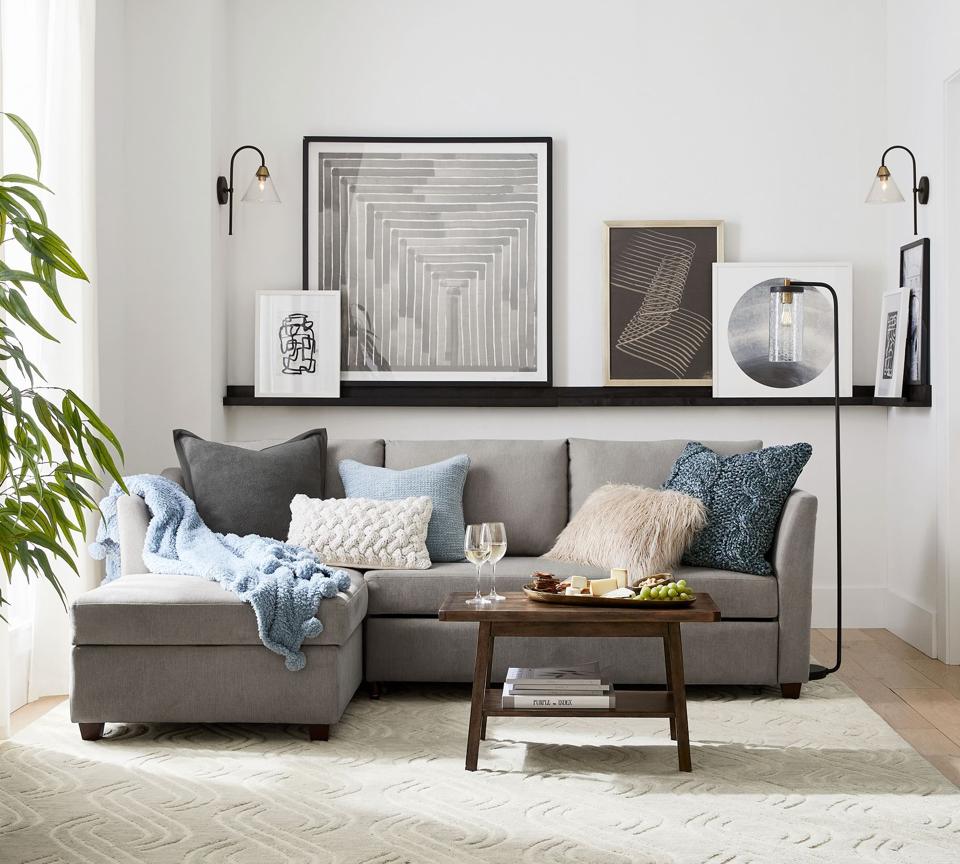 Mateo Rectangular Coffee Table next to an upholstered sectional.