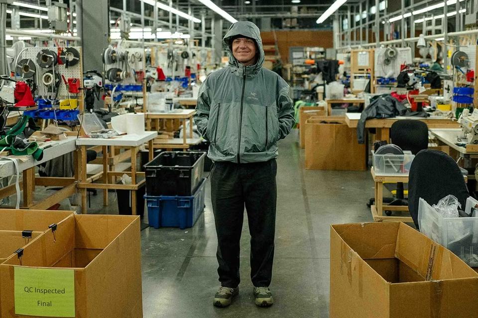 A man standing in the Arc'teryx ReGear warehouse