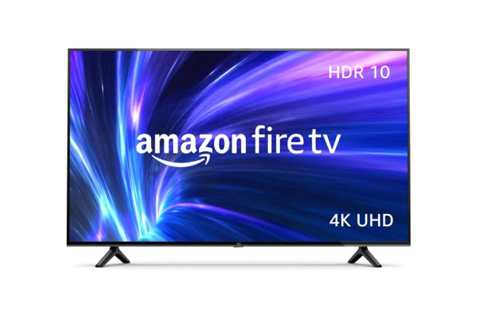 Product shot of Amazon 4-Series Fire TV displaying a purple background and text