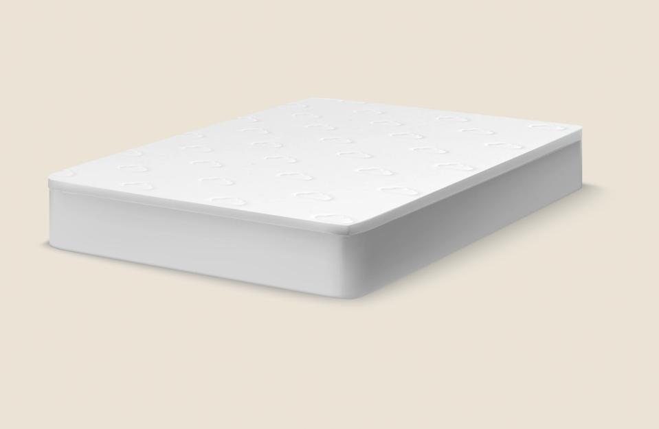 Puffy Deluxe Mattress Topper on a pale background