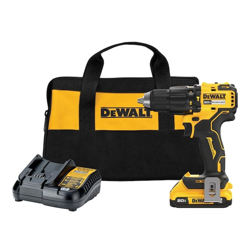 The DeWalt 20V Max Hammer Drill in black and yellow along with a charger and contractor bag